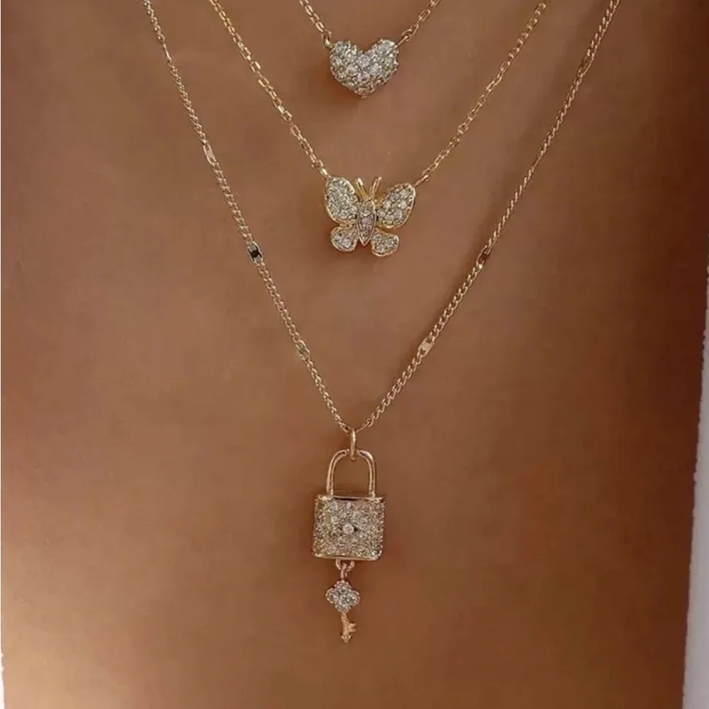 Gold and Silver Layered Necklace Set with Heart Butterfly and Key Pendants
